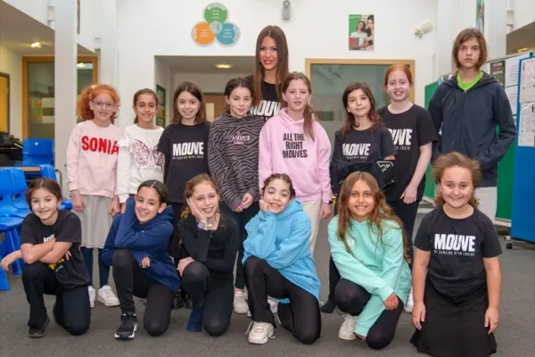 MOUVE class group in branded shirts