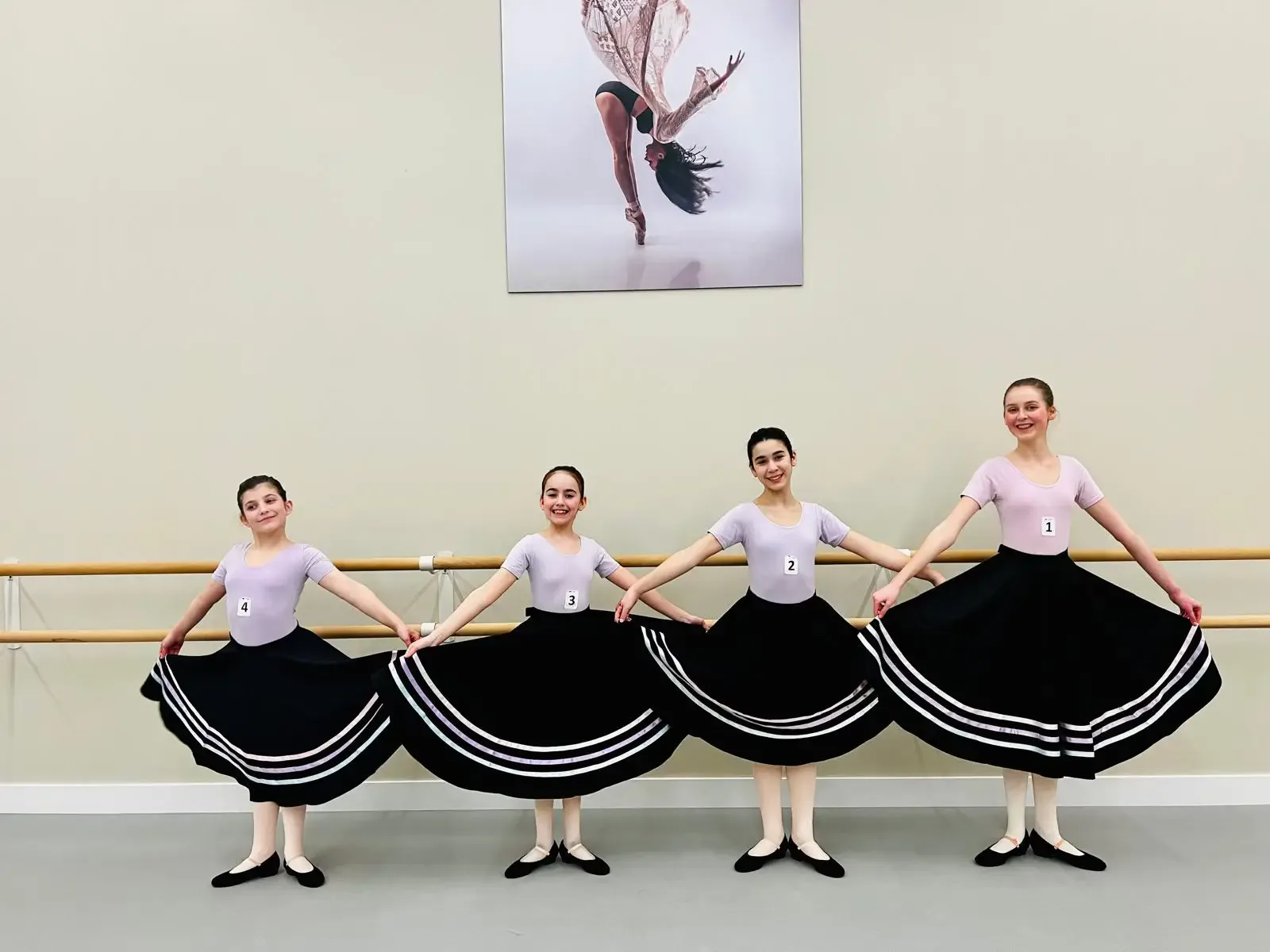 Young ballet dancers at the barre