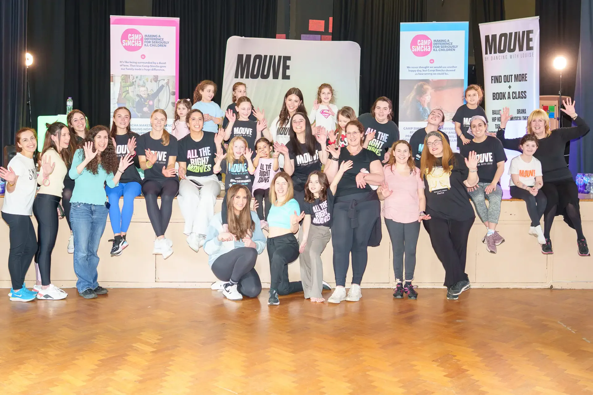 Mothers and daughters dancing together at the MOUVE charity dance party