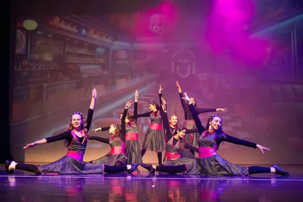 Dancers in costume during the show