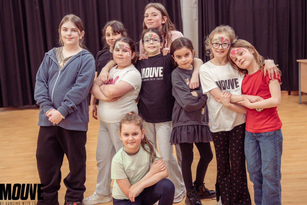 Children dancing at summer camp in London during fun-filled dance and drama session